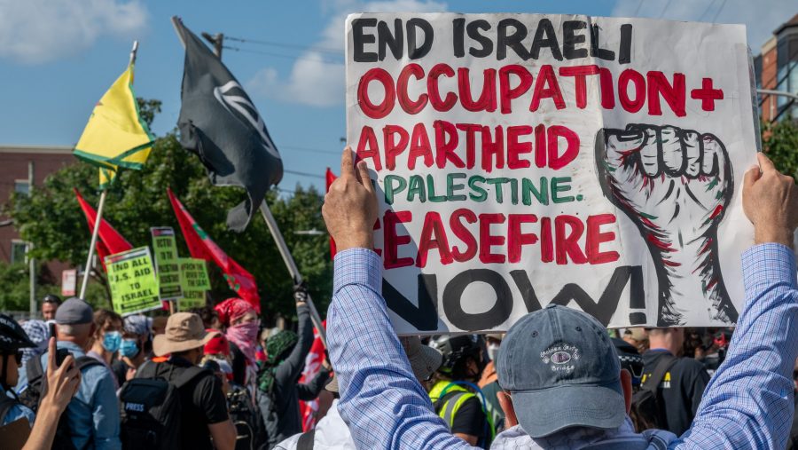 Pro-Palestinian and anti-war demonstrators march outside the Democratic National Convention in Chicago on Monday, Aug. 19, 2024.