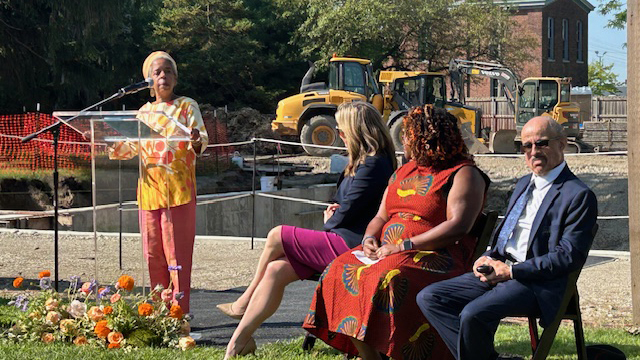 Jawana Jackson, daughter of Jackson House homeowners Dr. Sullivan Jackson and Richie Jean Sherrod, speaks at a site dedication ceremony at Greenfield Village in Dearborn, Mich. on Aug. 8, 2024.