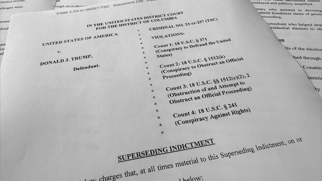 The superseding indictment against former President Donald Trump is photographed Tuesday, Aug. 27, 2024, after special counsel Jack Smith filed the new indictment against Trump that keeps the same criminal charges but narrows the allegations against him following a Supreme Court opinion conferring broad immunity on former presidents.