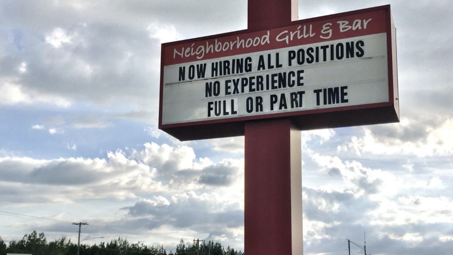 A sign at a Sault St. Marie restaurant advertises open jobs.