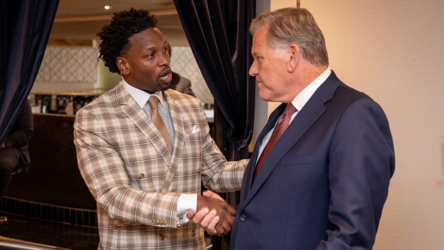 Michigan U.S. Senate candidate Mike Rogers is introduced at a roundtable for conservative Black clergy in Detroit by Pastor Lorenzo Sewell of 180 Church.