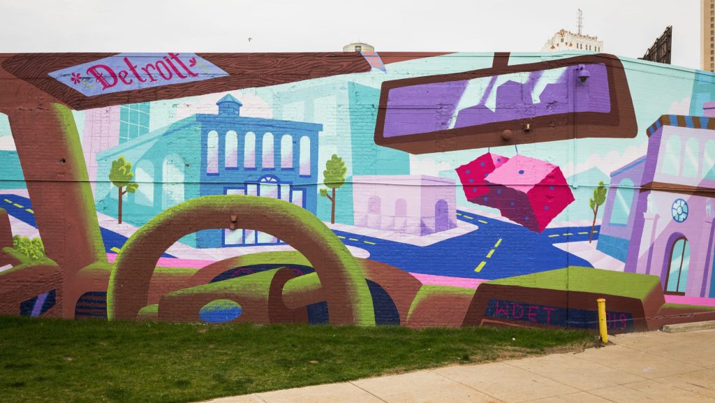 A mural on the corner of Broadway and Gratiot in Detroit by artist Michael Polakowski features WDET 101.9 FM on the dial.