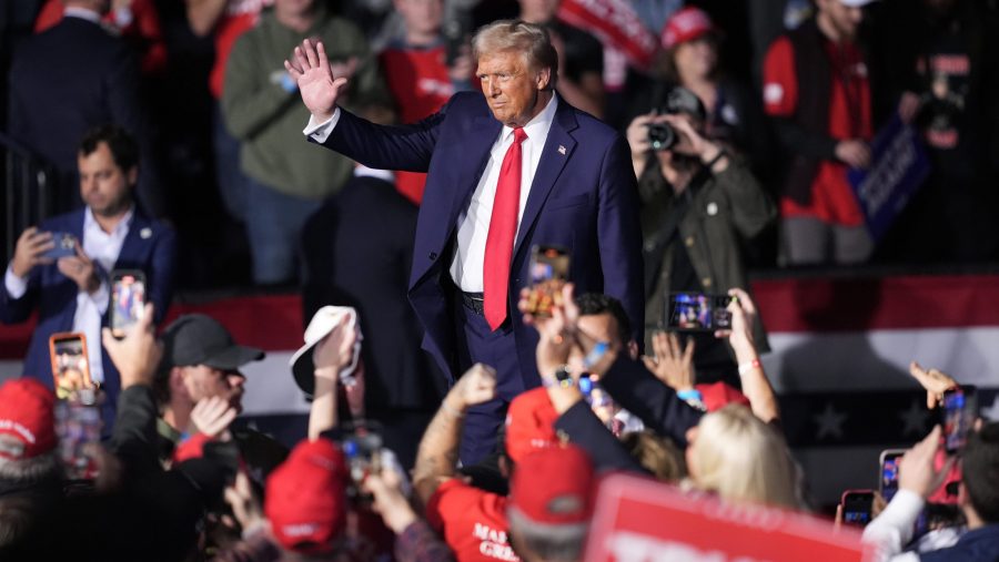 Donald Trump waves to a rally crowd in Grand Rapids on November 5, 2024