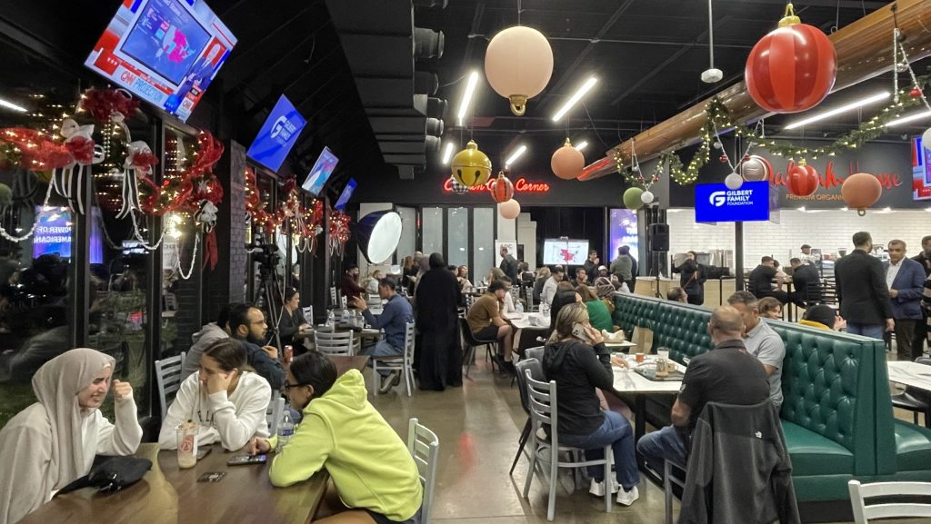 Several voters gathered at The Canteen in Dearborn on election night to watch results in real-time.