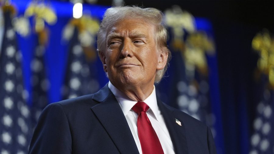 Republican presidential nominee former President Donald Trump arrives at an election night watch party at the Palm Beach Convention Center, Wednesday, Nov. 6, 2024, in West Palm Beach, Fla.