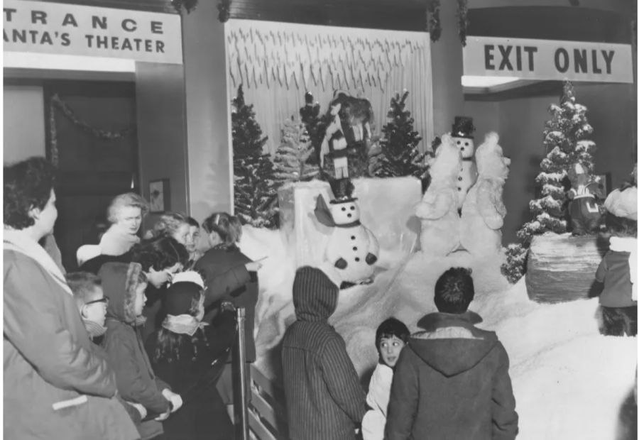 Visitors take in a holiday display at the Ford Rotunda Christmas Fantasy in 1959.