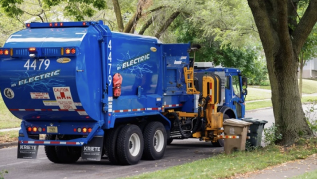 An all-electric recycling truck in Madison, Wisconsin. Similar trucks will be operating in Macomb, Oakland, and Wayne counties.