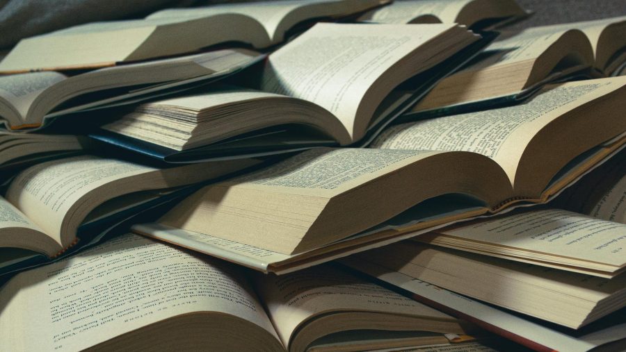 a pile of open books