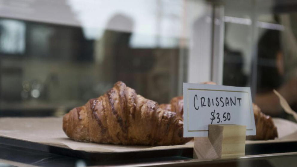 Two classic croissants in the display case at Chef Sergey’s Bakery during the grand opening in Midland, Mich., Saturday, Jan. 18, 2025.