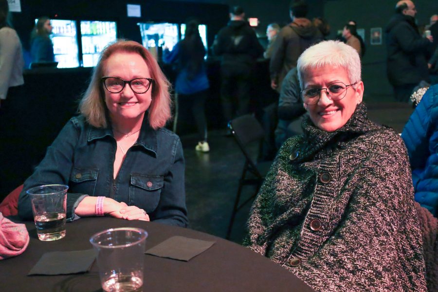 WDET Leadership Circle member Ruby Duffield (left) poses with a fellow member at the station's 75th anniversary party.