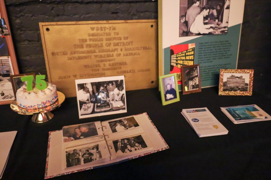 An album of historical photos from WDET's early years are displayed at the station's 75th anniversary wrap party.