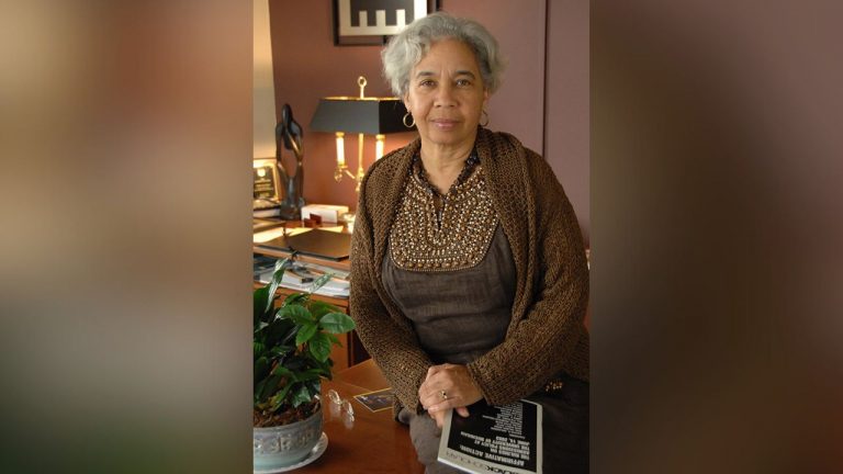 Dr. Melba Joyce Boyd sits in her office
