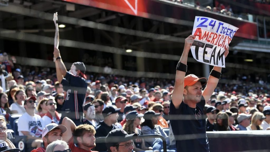 A photo of Tigers diehard Josh Tebeau rooting on the team in Cleveland.