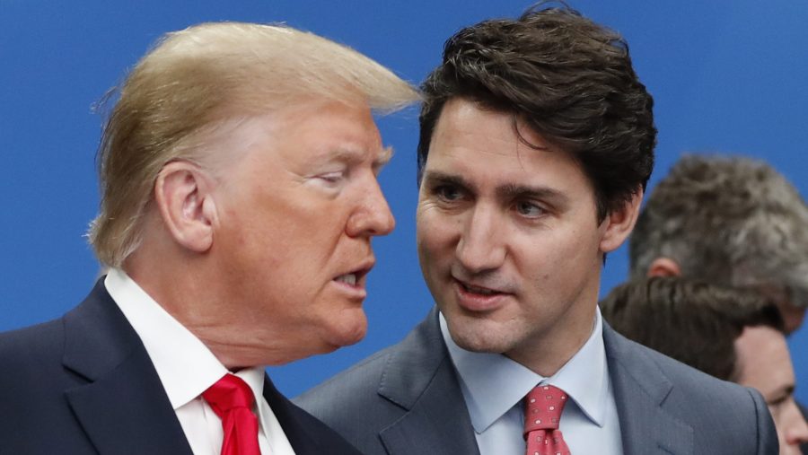 FILE - U.S. President Donald Trump, left, and Canadian Prime Minister Justin Trudeau talk prior to a NATO round table meeting at The Grove hotel and resort in Watford, Hertfordshire, England, Dec. 4, 2019.