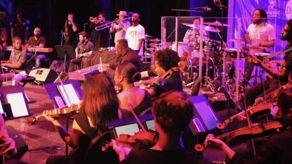 Urban Art Orchestra performs onstage