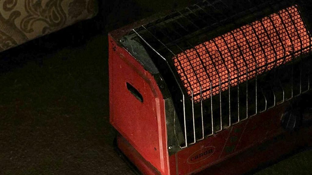 A space heater sits on the floor