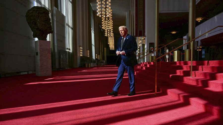 President Donald Trump walks as he tours the John F. Kennedy Center for the Performing Arts in Washington, Monday, March 17, 2025.