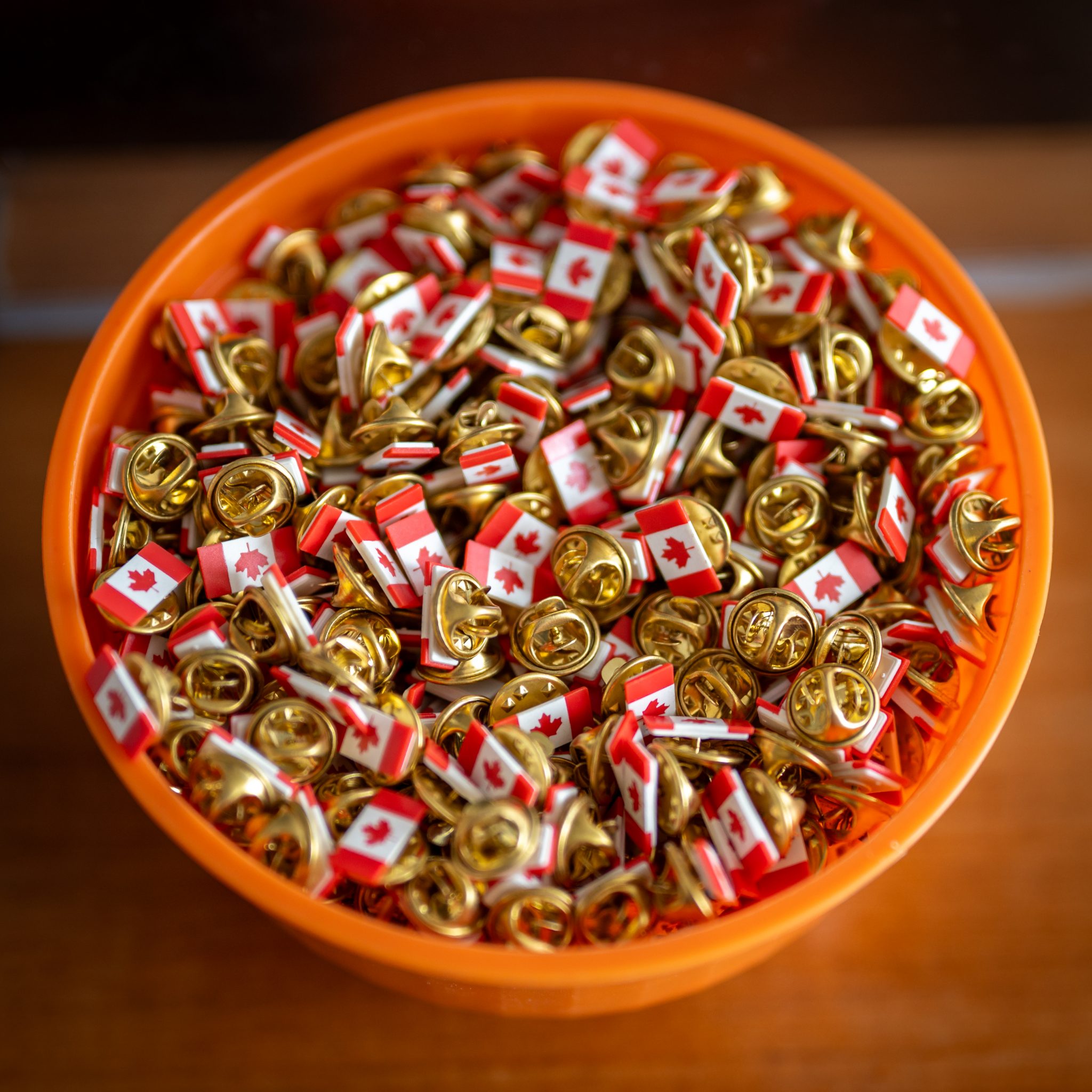 A bowl of tiny Canadian Flag pins in the office of MP Brian Masse