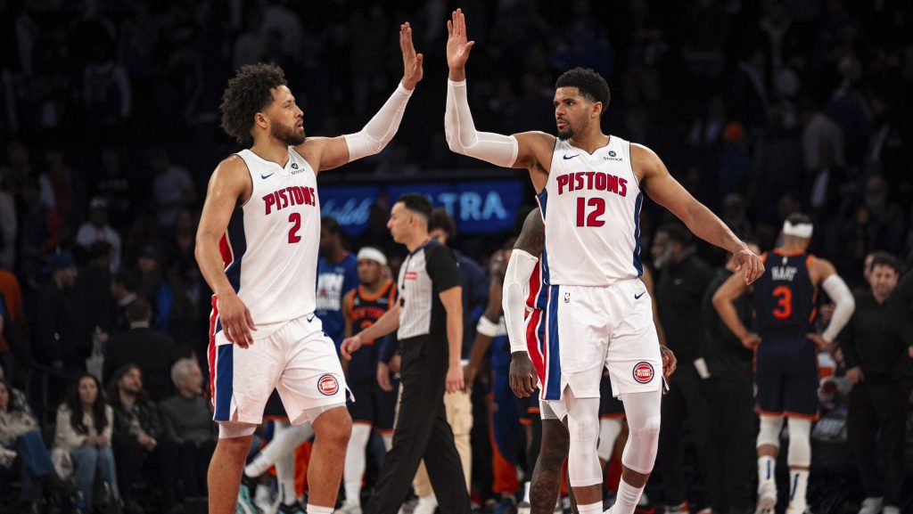 Detroit Pistons guard Cade Cunningham (2) and forward Tobias Harris (12) high-five at the end of Game 2 of an NBA basketball first-round playoff series against the New York Knicks, Monday, April 21, 2025, in New York.