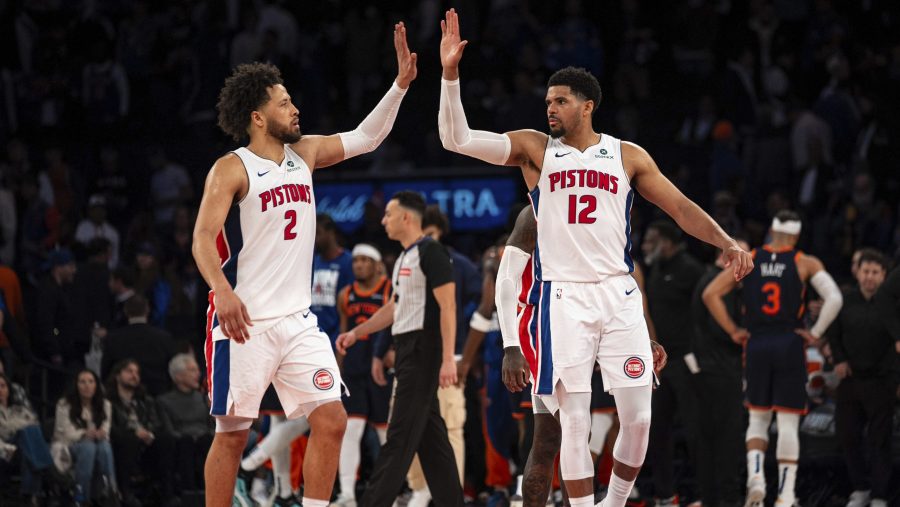 Detroit Pistons guard Cade Cunningham (2) and forward Tobias Harris (12) high-five at the end of Game 2 of an NBA basketball first-round playoff series against the New York Knicks, Monday, April 21, 2025, in New York.