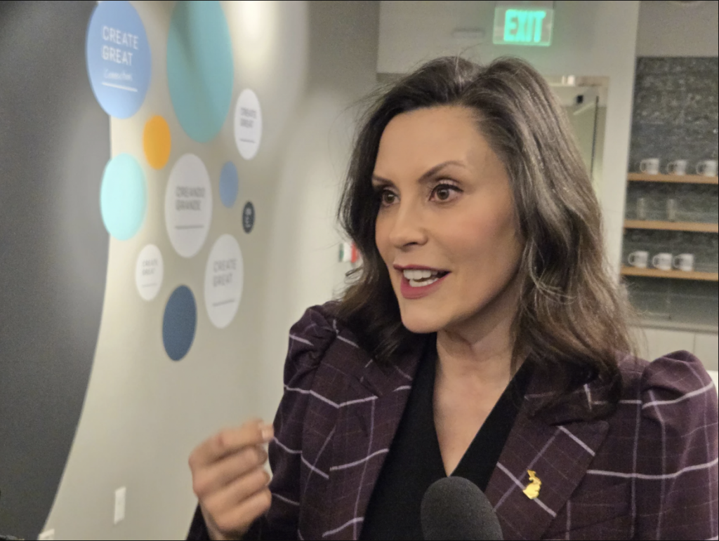 Governor Gretchen Whitmer speaks to reporters in Grand Rapids.