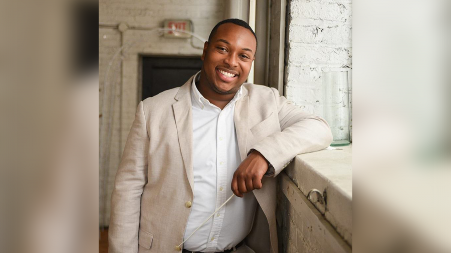 A photo of Julian Goods, the new artistic director of the Rackham Choir.