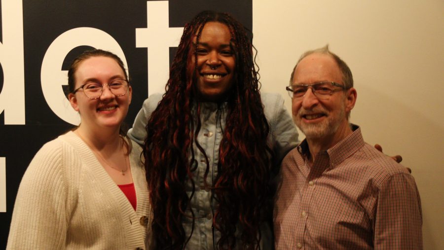 WDET intern Natalie Albrecht and Metro co-host Tia Graham pose with Neil Rubin, honorary chairperson of Bookstock, at WDET Studios.