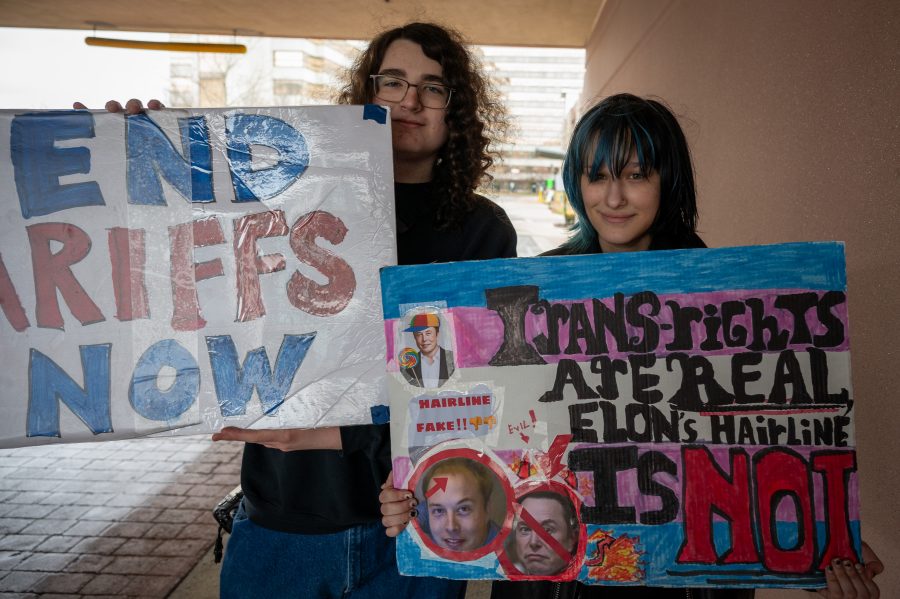 Li from Livonia and a friend during the #HandsOff protest in Detroit on April 5, 2025.
