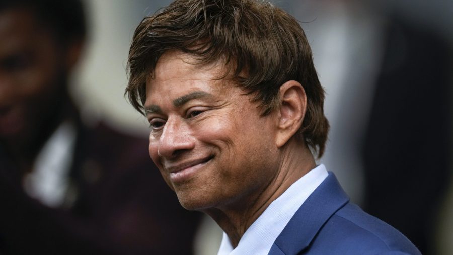FILE - Rep. Shri Thanedar, D-Mich., listens to comments before the NAACP Detroit branch Fight for Freedom Fund dinner in Detroit, May 19, 2024.