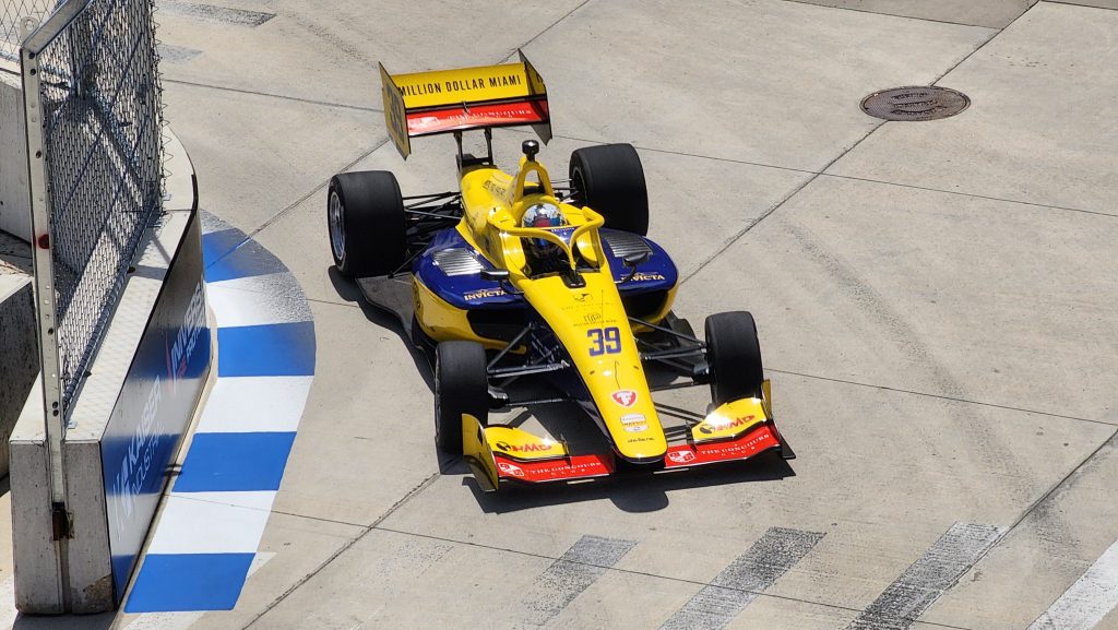 A yellow racecar at the Detroit Grand Prix