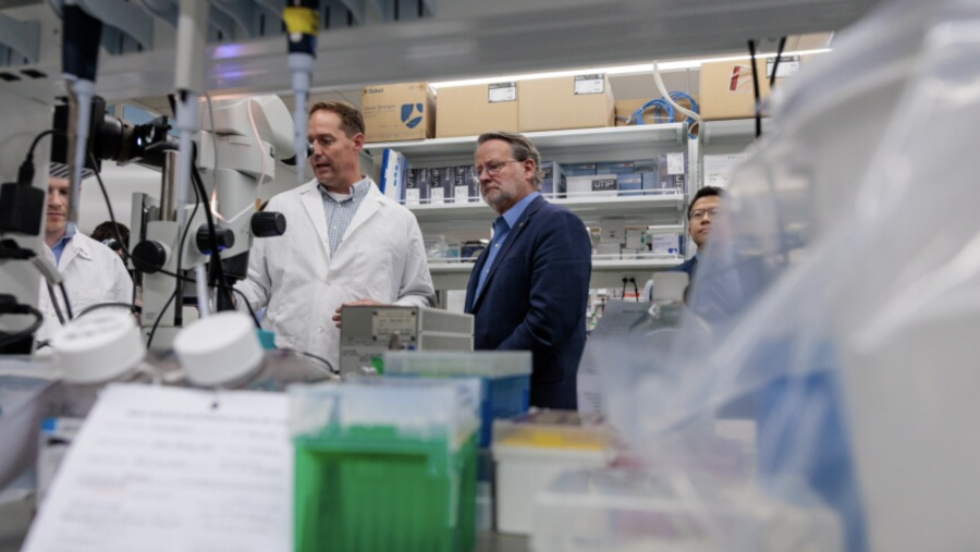 U.S. Sen. Gary Peters, right, tours the Institute for Quantitative Health Science and Engineering at Michigan State University in East Lansing, May 16, 2025.