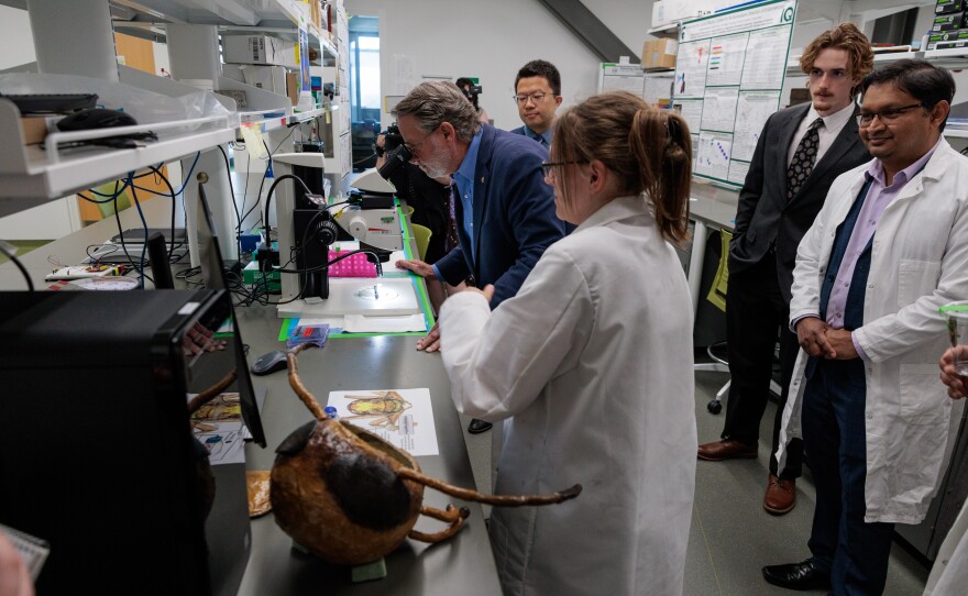 U.S. Sen. Gary Peters, left, tours the Institute for Quantitative Health Science and Engineering at Michigan State University in East Lansing, May 16, 2025.
