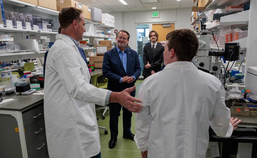U.S. Sen. Gary Peters, center, tours the Institute for Quantitative Health Science and Engineering at Michigan State University in East Lansing, May 16, 2025.