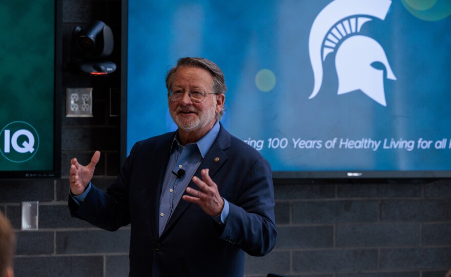 U.S. Sen. Gary Peters speaks to reporters after touring the Institute for Quantitative Health Science and Engineering at Michigan State University in East Lansing, May 16, 2025.