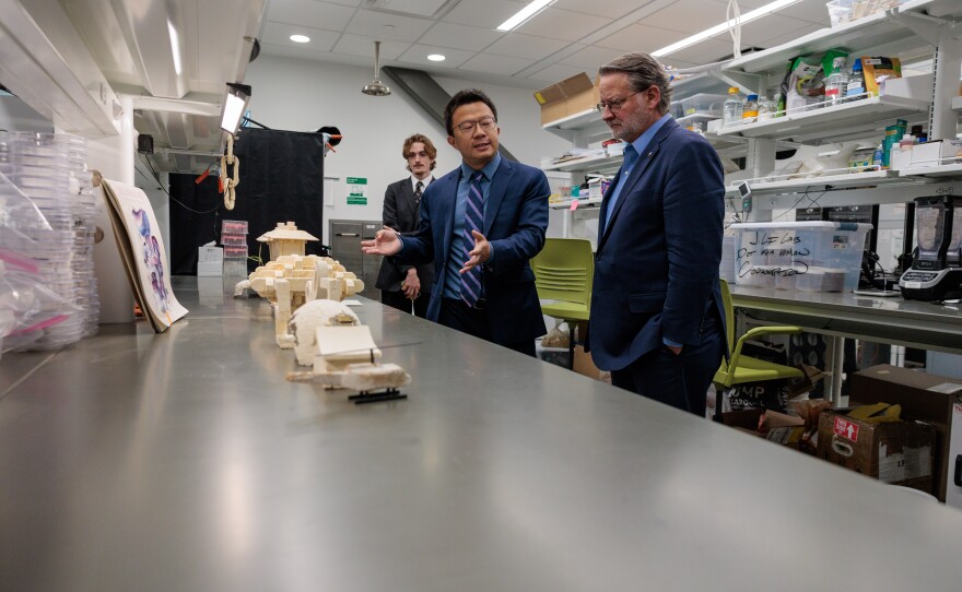 U.S. Sen. Gary Peters, right, tours the Institute for Quantitative Health Science and Engineering at Michigan State University in East Lansing, May 16, 2025.