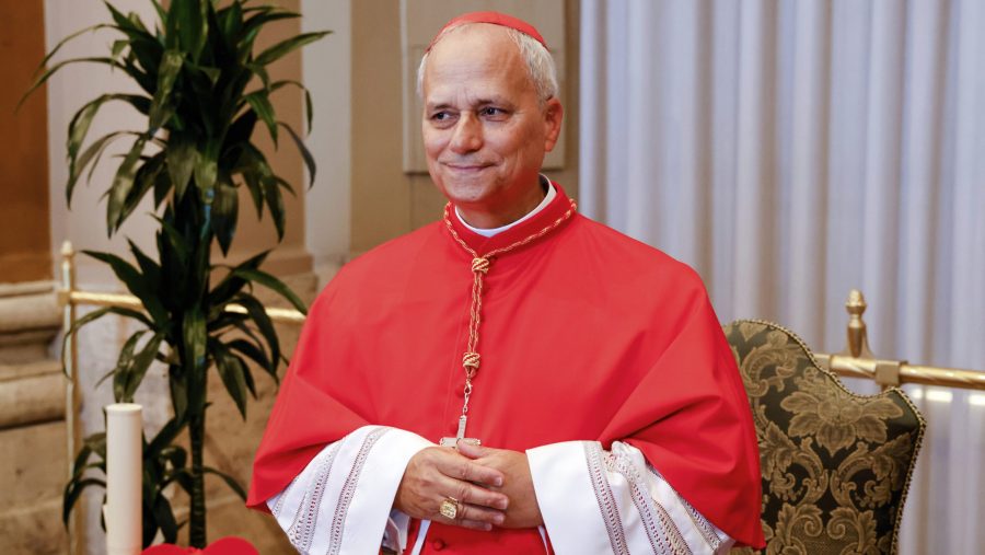 FILE - New Cardinal Robert Francis Prevost, prefect of the Dicastery for Bishops, stands for a portrait at the end of the consistory where Pope Francis elevated 21 new cardinals in St. Peter's Square at the Vatican, Sept. 30, 2023.