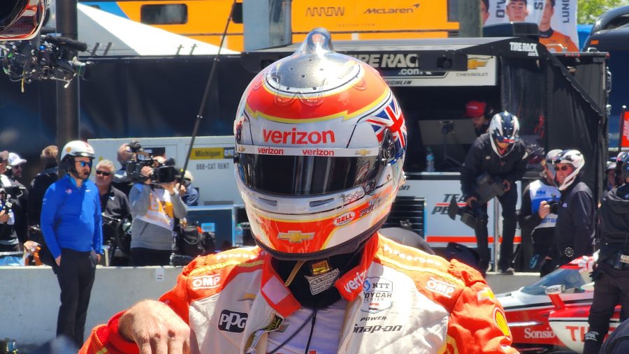 Will Power gets out of his car after qualifying at the 2025 Detroit Grand Prix.