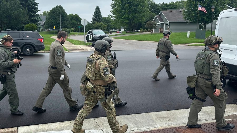 Armed police walk the streets of Minnesota