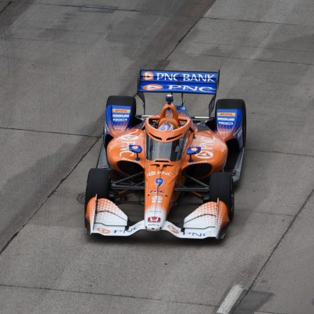 Driver Scott Dixon races in the Detroit Grand Prix