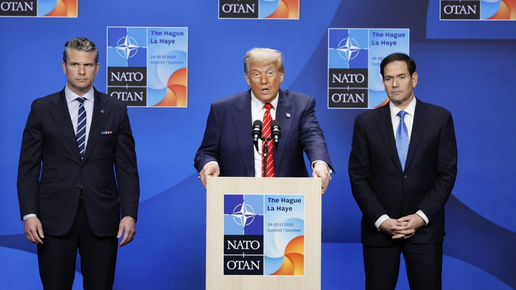 President Donald Trump, center, speaks during a media conference at the NATO summit in The Hague, Netherlands, Wednesday, June 25, 2025.