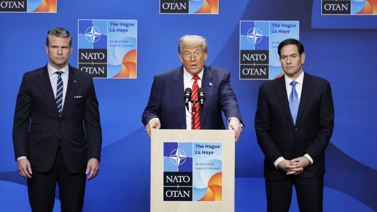 President Donald Trump, center, speaks during a media conference at the NATO summit in The Hague, Netherlands, Wednesday, June 25, 2025.