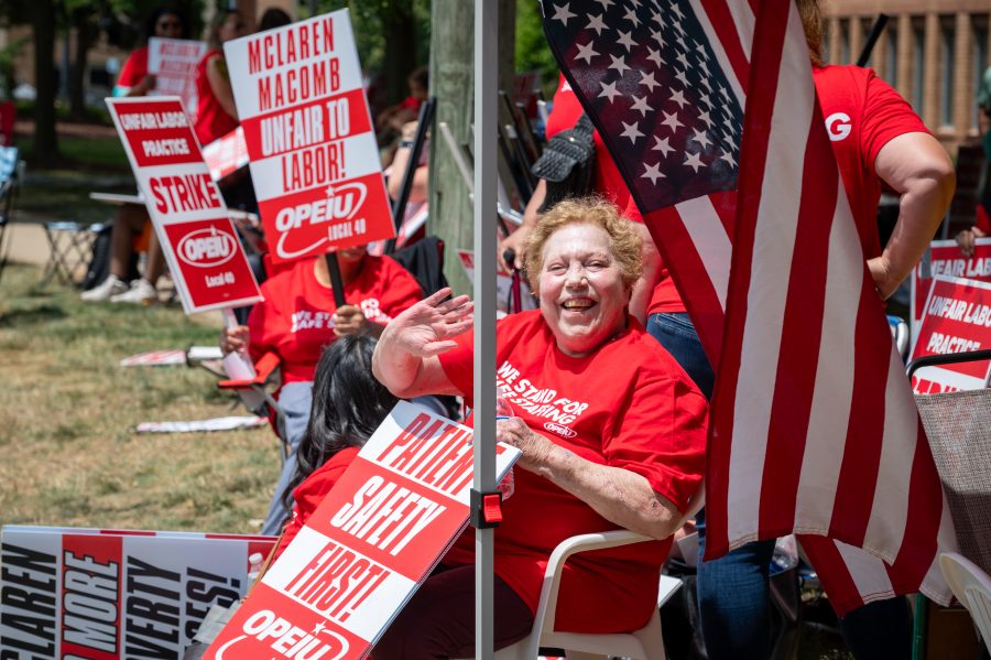 Health care workers strike outside of McLaren Macomb Hospital on July 8, 2025, over staffing and pay dissatisfaction.