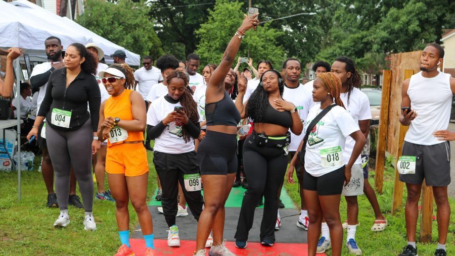 Racers wait at the start of the 7-2 Day 5K in Detroit's Hubbell-Puritan neighborhood.