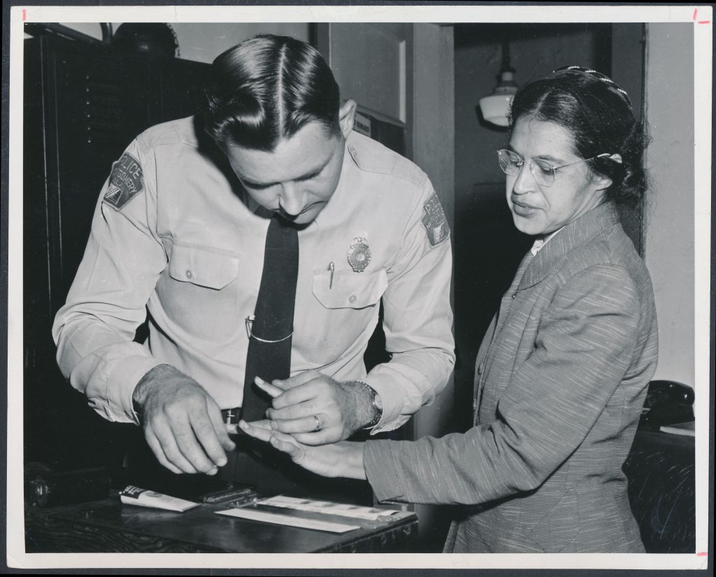 Rosa_Parks_being_fingerprinted_by_Deputy_Sheriff_D.H._Lackey_after_being_arrested_on_February_22,_1956,_during_the_Montgomery_bus_boycott_-_Original