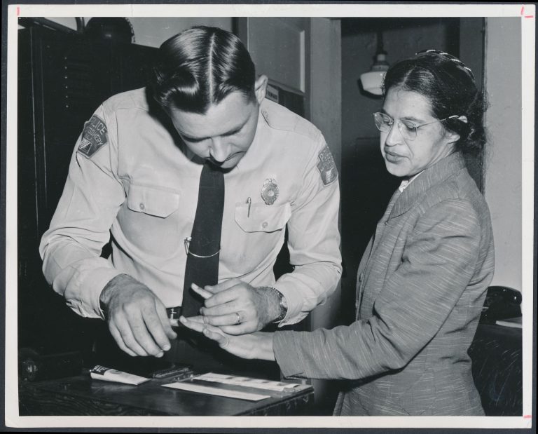Rosa_Parks_being_fingerprinted_by_Deputy_Sheriff_D.H._Lackey_after_being_arrested_on_February_22,_1956,_during_the_Montgomery_bus_boycott_-_Original