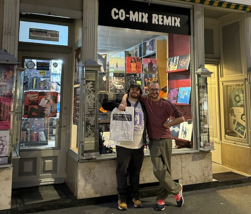 Ryan and Walter pose together by the Co-mix Remix storefront.