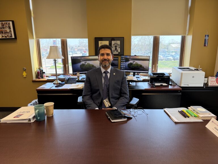 Dean Ahmed Radwan sits in his office