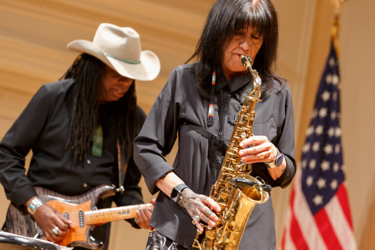 Joy Harjo playing saxophone with her band during her opening event as the U.S. Poet Laureate at the Library of Congress,